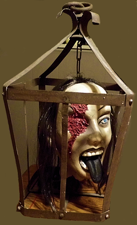gruesome head in a cage halloween prop